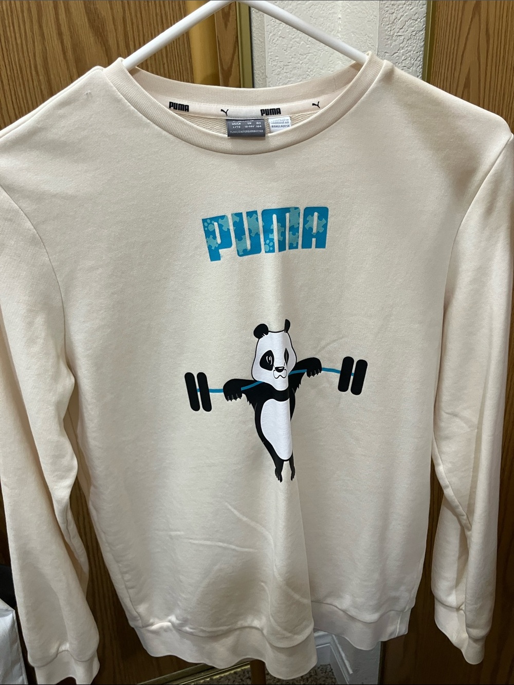 Puma Cream Sweatshirt with Blue Logo and Panda Graphic